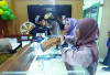 Harga Emas Turun, Pedagang di Pasar Bambu Kuning Tetap Mengeluh Sepi Pembeli